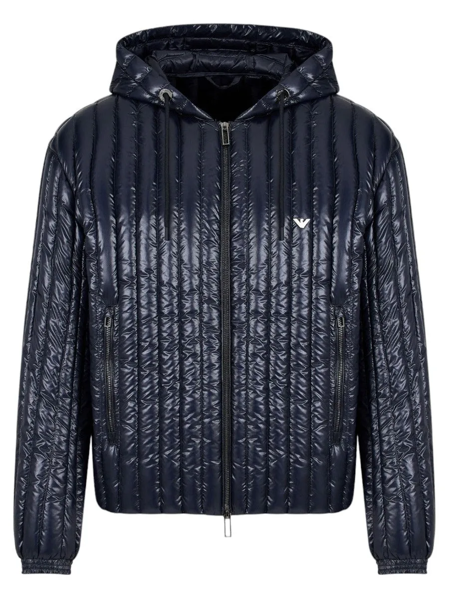 Piumino con cappuccio water repellent in nylon matelassé verticale